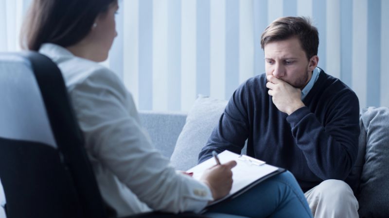 person with ptsd with psychiatrist