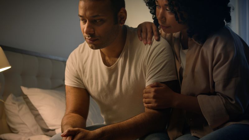 comforting support sad upset spouse