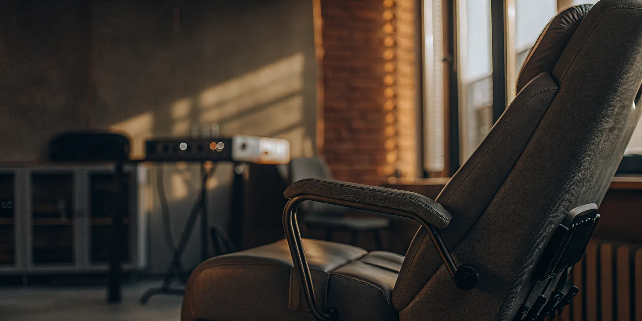 Modern TMS therapy chair in a sunlit clinic, an effective treatment for OCD.