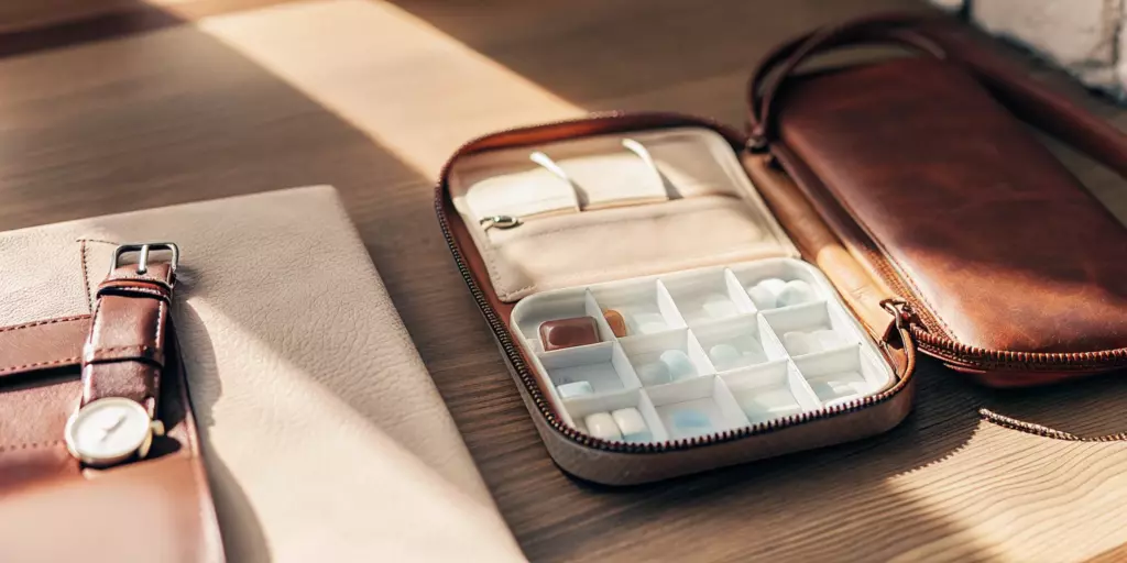 Medication management tips for mental health using a daily pill organizer.