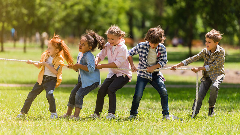 children playing tug of war