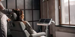 Patient receiving deep TMS treatment for OCD.