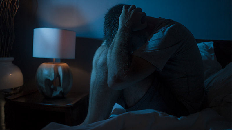 depressed worried man bed suffering depression