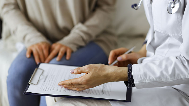 doctor and patient discussing current health examination