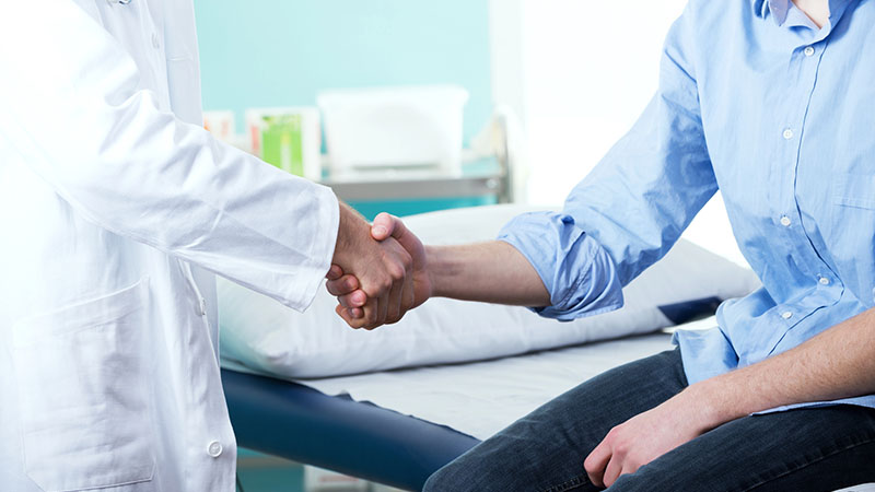 doctor and patient doing a handshake