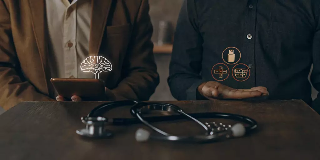A doctor explains the real cost of TMS therapy without insurance to a patient.