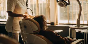 Patient receiving TMS therapy for OCD in a comfortable treatment chair.