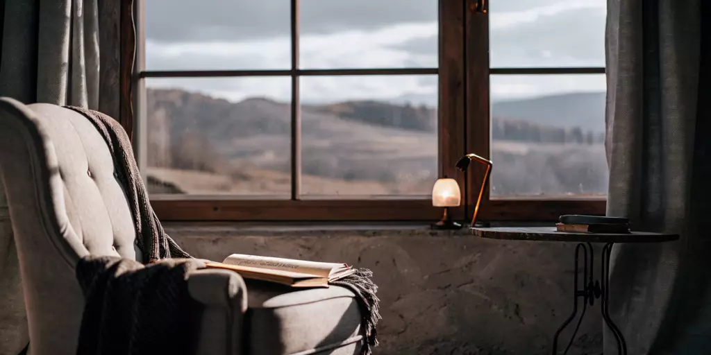 A peaceful reading nook showing the successful outcome of TMS for anxiety.