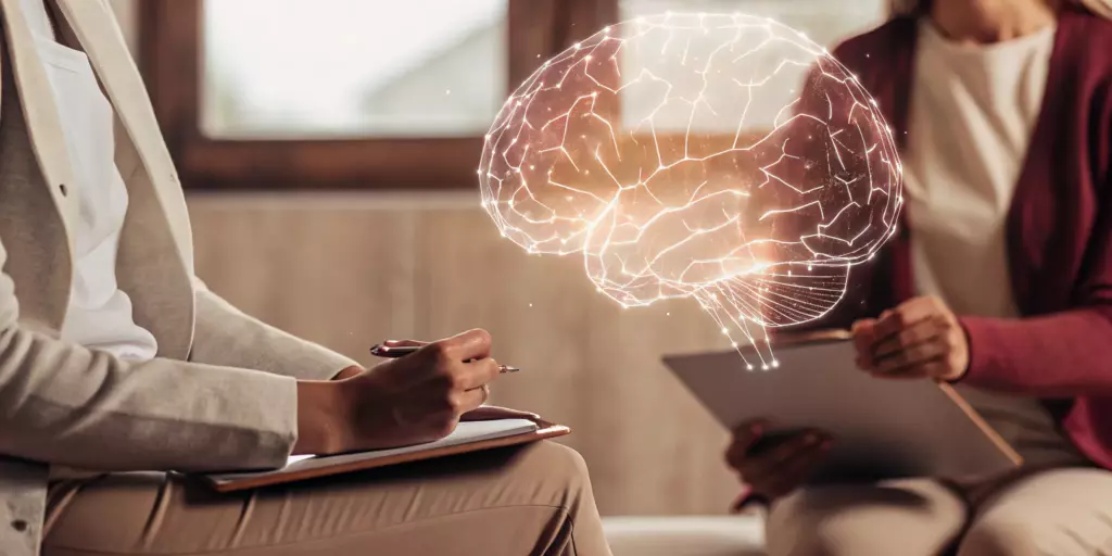 Two people discussing anxiety medication management with a digital brain graphic.