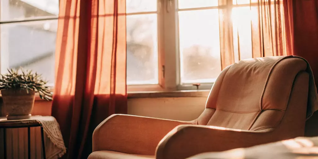 A sunlit room with an armchair, a calm setting for learning about FDA-approved depression treatment.
