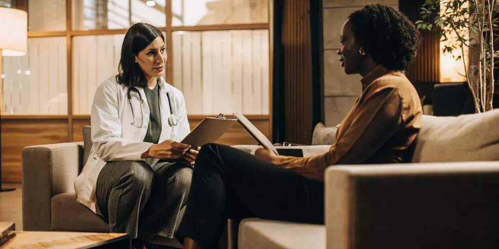 A doctor and patient review the best treatment for medication resistant depression.